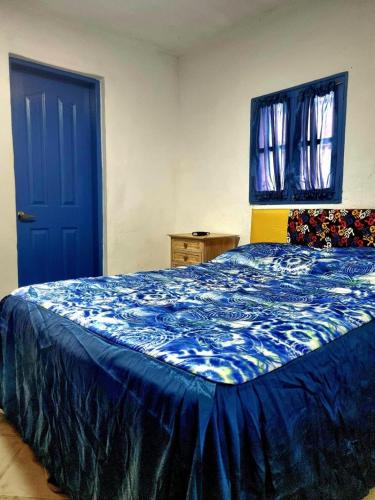 Llit o llits en una habitació de Puerto Molino