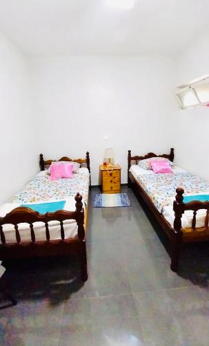 Una cama o camas en una habitación de Cozy Home with Terrace Views!