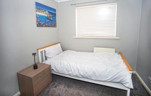 Una cama o camas en una habitación de The Leigh Nest