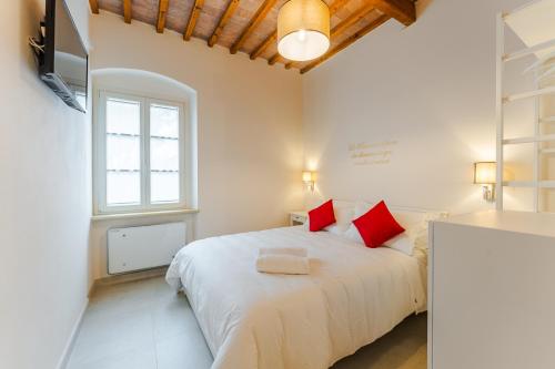 Postel nebo postele na pokoji v ubytování Relais Villa Rizzi