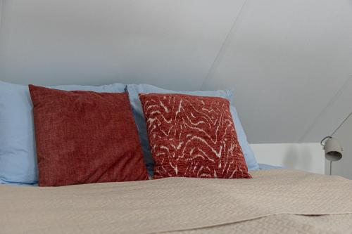 Letto o letti in una camera di Vakantieverblijf Aan de Vaart