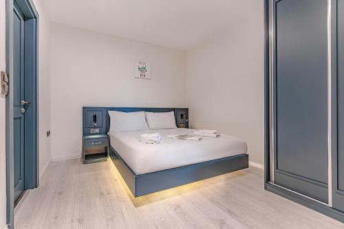 Ένα ή περισσότερα κρεβάτια σε δωμάτιο στο Tulii Rooms