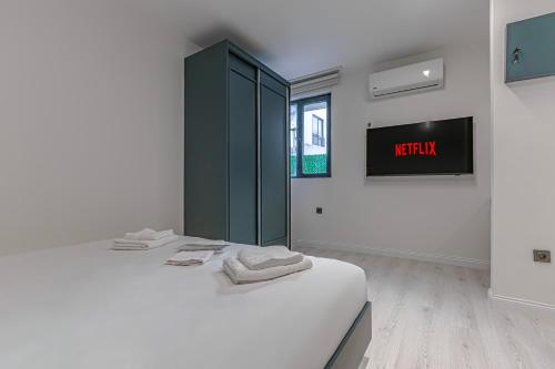 Ένα ή περισσότερα κρεβάτια σε δωμάτιο στο Tulii Rooms