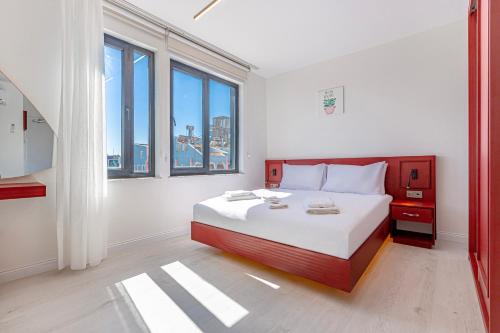 Postel nebo postele na pokoji v ubytování Tulii Rooms