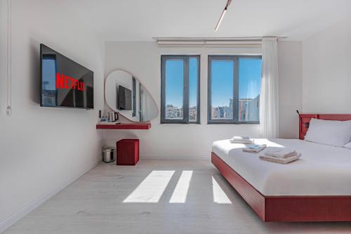 Postel nebo postele na pokoji v ubytování Tulii Rooms