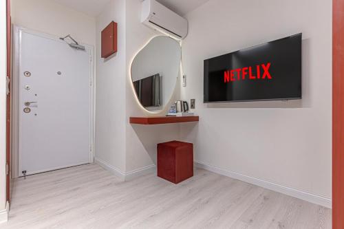 Μια τηλεόραση ή/και κέντρο ψυχαγωγίας στο Tulii Rooms