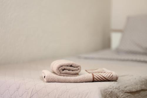 Cama o camas de una habitación en Apartments Moskov