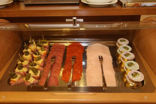 a plastic container filled with different types of food at Pension Kasper in Vienna