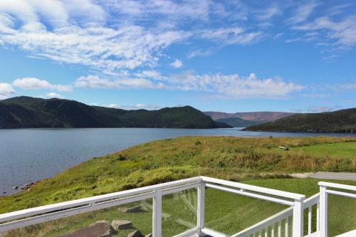 a view of a lake from the balcony of a house at Neddies Harbour Inn in Norris Point