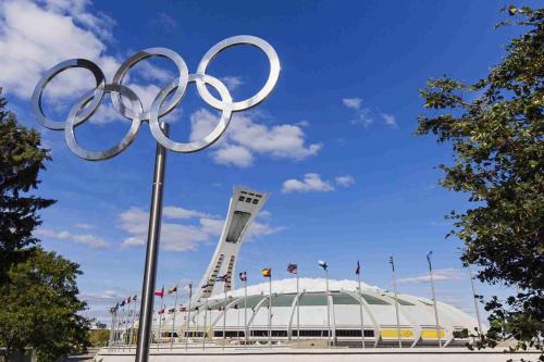 a view of the olympic rings in front of a stadium at Tranquille Discret Privé in Laval