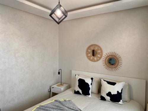 Ένα ή περισσότερα κρεβάτια σε δωμάτιο στο Appartement près de Novotel face au parc WELCOME STAY
