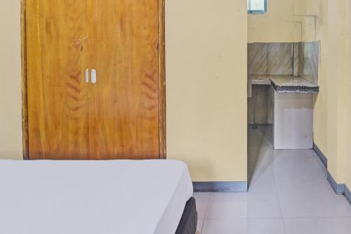 Kuchyň nebo kuchyňský kout v ubytování Hotel O Susupuan KostNearTaman Deki Lestari