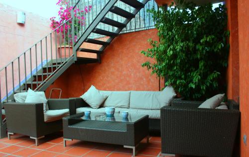 Posezení v ubytování Hotel Conde de Cárdenas