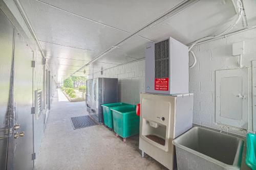 an empty bathroom with a sink and a counter at Masters Inn Selma Smithfield I-95 By OYO in Selma