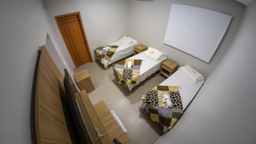 Postel nebo postele na pokoji v ubytování Hotel Marajó - Turismo de Experiência
