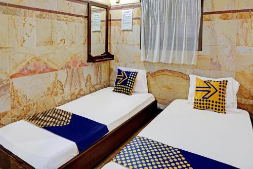 Ένα ή περισσότερα κρεβάτια σε δωμάτιο στο Hotel O Griyo Werdiningsih