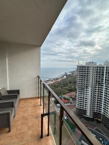 a balcony with a view of the ocean at Arcadia apartment & sea terrace in Odesa