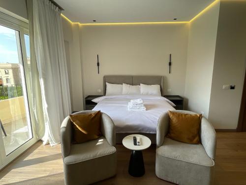 Ένα ή περισσότερα κρεβάτια σε δωμάτιο στο Ryan's Inn Studio apartment