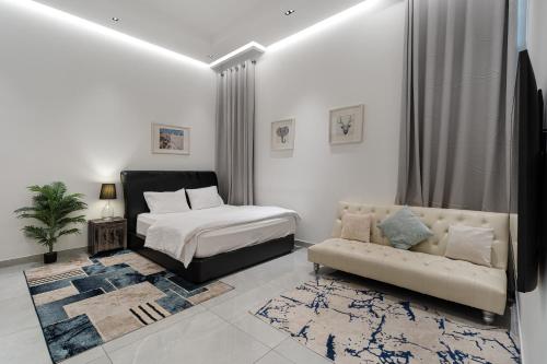 Ένα ή περισσότερα κρεβάτια σε δωμάτιο στο Boutique-Trade Center