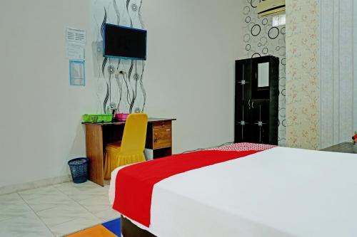 Fotografie z fotogalerie ubytování OYO 92405 Evergreen Hotel & Resto Near GARDU INDUK MUARA DUA v destinaci Muaradua