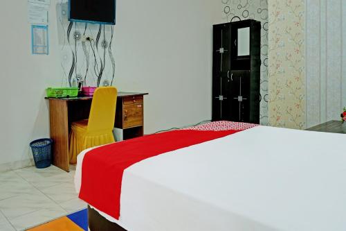 Fotografie z fotogalerie ubytování OYO 92405 Evergreen Hotel & Resto Near GARDU INDUK MUARA DUA v destinaci Muaradua
