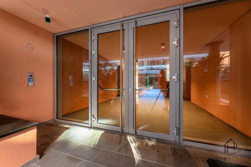 an image of a glass door in a building at Luxury by the Sea - Free Park - Gym - UltraWiFi in Genova