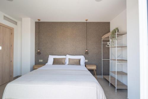 Letto o letti in una camera di NUBA apartamentos turísticos