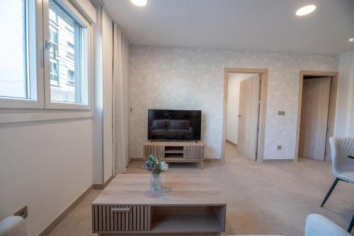 TV o dispositivi per l'intrattenimento presso NUBA apartamentos turísticos
