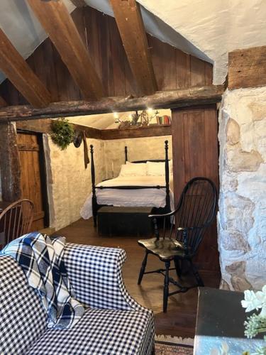 Ένα ή περισσότερα κρεβάτια σε δωμάτιο στο The Inn on the Olde Homestead