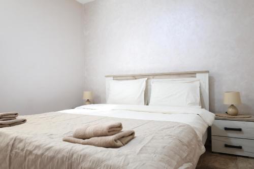 Cama o camas de una habitación en Apartments Moskov