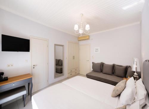 TV a/nebo společenská místnost v ubytování Eva Beach Hotel Lefkada ΙΙ