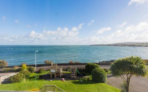 a view of the ocean from a building at Trecastell Hotel in Amlwch