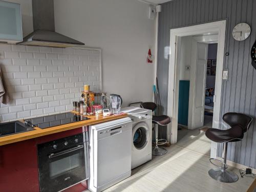 Kuchyň nebo kuchyňský kout v ubytování Chambre privée, parking gratuit