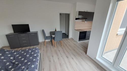 Kuchyňa alebo kuchynka v ubytovaní Apartmán u letiště