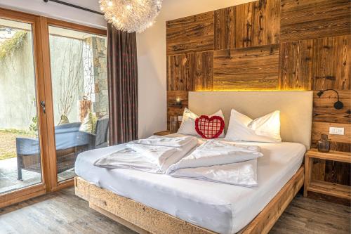 Postel nebo postele na pokoji v ubytování Alpine Mountain Chalet