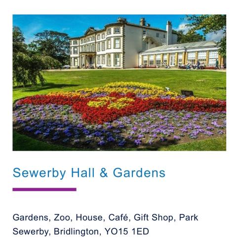 a website with a picture of a flower garden at Jay 35 4 bed sleeps up to 8 dog friendly caravan Thornwickbay haven site on East coast in Flamborough