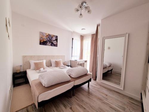 Una cama o camas en una habitación de Pirotski amanet