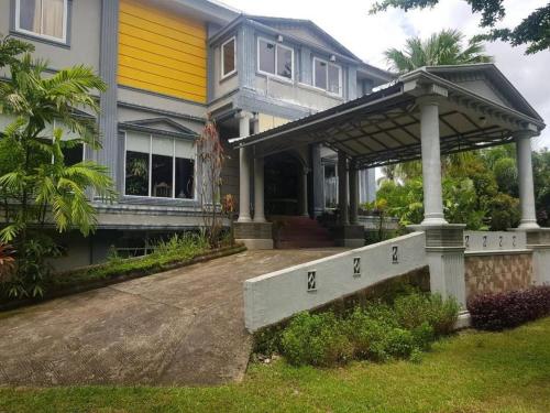 Сад в Hotel O Rumah Massagena Syariah Near Gedung Olahraga Enrekang