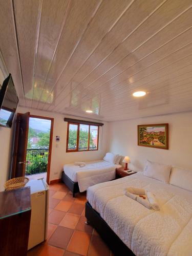 Katil atau katil-katil dalam bilik di Hotel Villa Carlinita