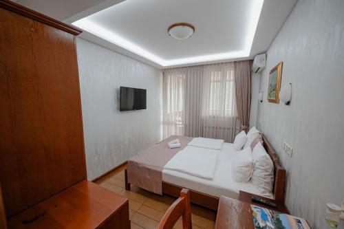 Cama o camas de una habitación en Hotel Zlatiborska Noc