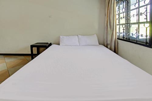 Hotel O Motel Langkoにあるベッド