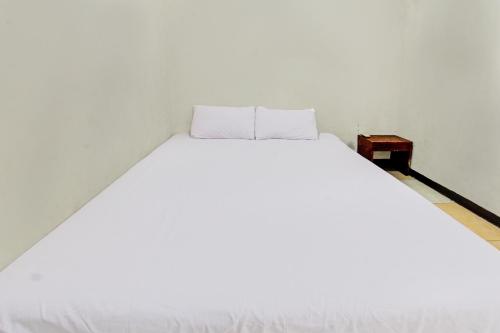 Hotel O Motel Langkoにあるベッド