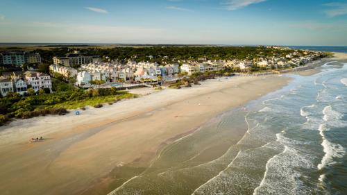 an aerial view of a beach with houses and the ocean at Shipwatch 321D by Wild Dunes, Oceanfront Condo in Isle of Palms