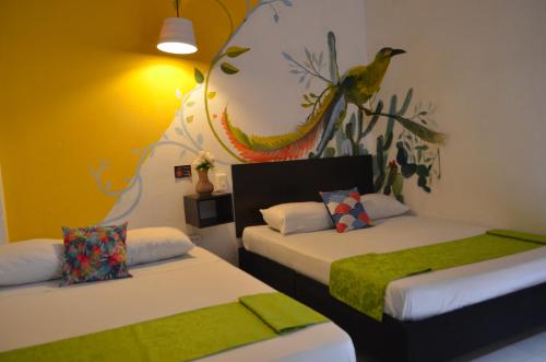 Postel nebo postele na pokoji v ubytování Casona Don Juan Hostel