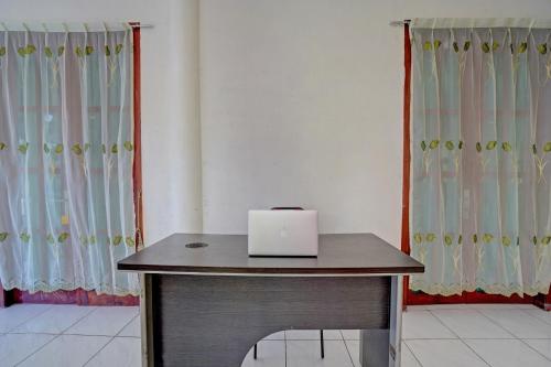 Фотография из галереи Collection O 92897 Hotel Intan Near Kantor Syahbandar Bawean в городе Sangkapura