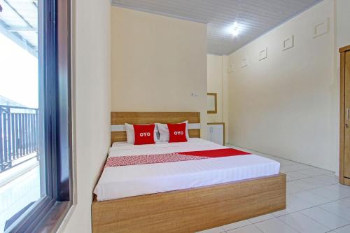 Postel nebo postele na pokoji v ubytování Hotel O Mi Casa Inn