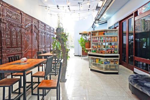 Coin salon dans l'établissement Hotel O Trisna Patihan Resort