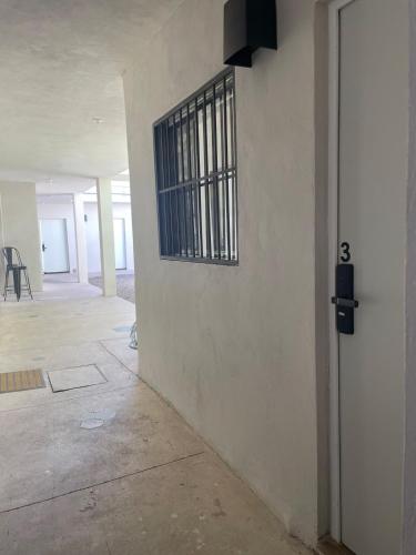 an empty room with a gate on the side of a building at LiV109 Norte Depa 3 in Cd Obregon in Ciudad Obregón