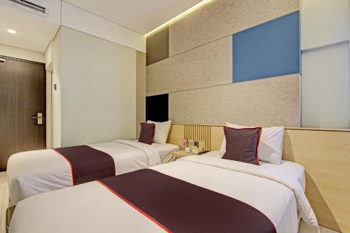 Photo de la galerie de l'établissement Townhouse Oak IXO Hotel, à Semarang