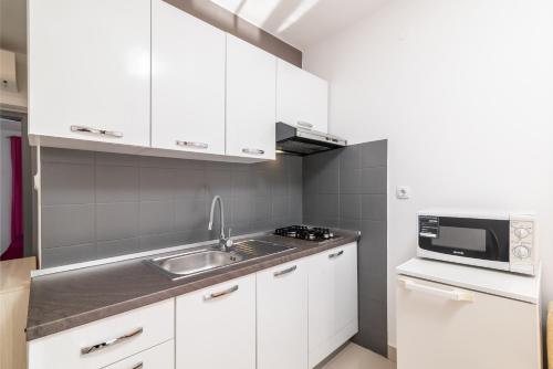 Kuchyň nebo kuchyňský kout v ubytování Apartments with parking space Rabac, Labin - 6464